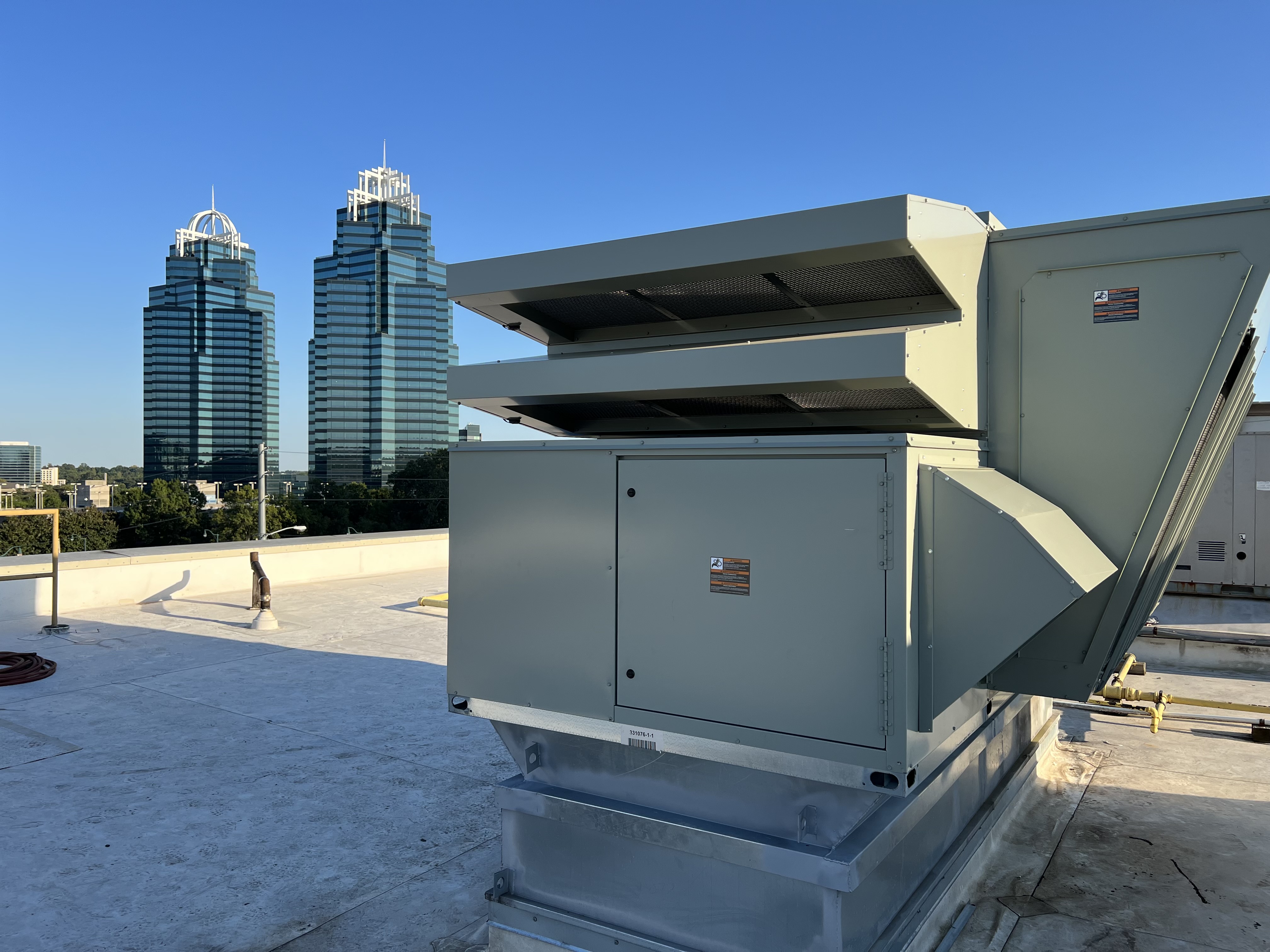 C2H crew working on commercial HVAC equipment